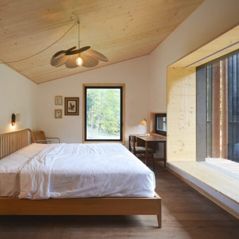 Bright bedroom with a wooden ceiling